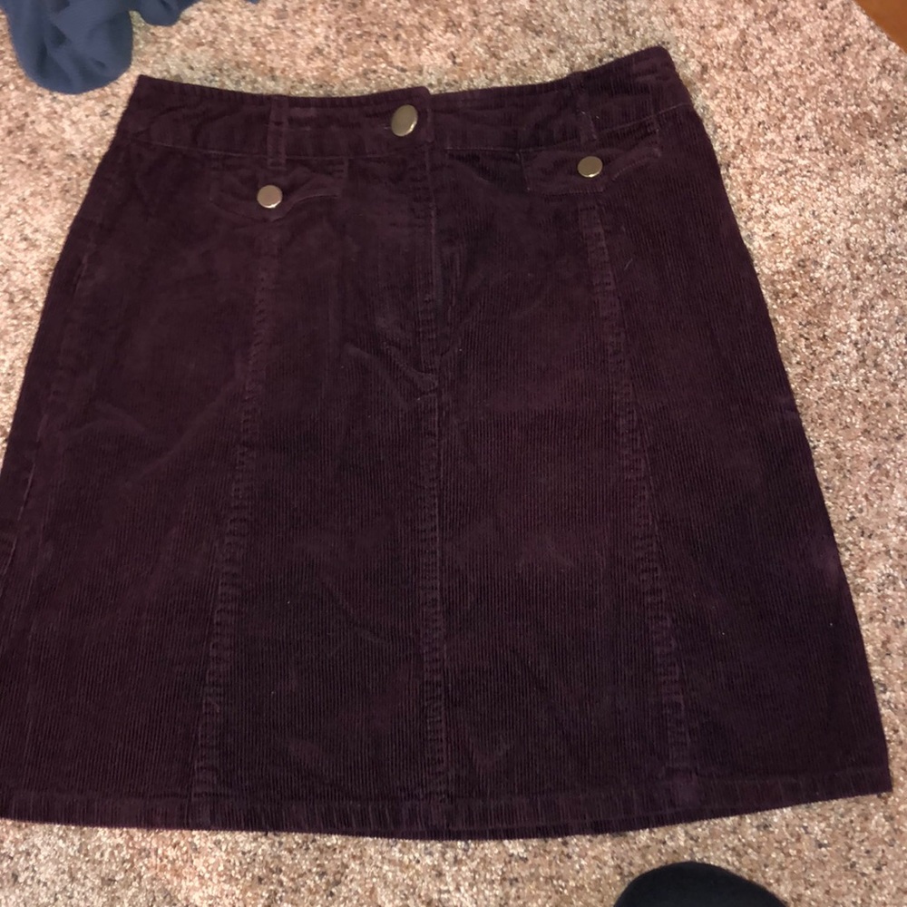 maroon skirt with gold buttons